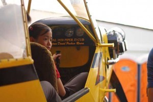 Sophia and Gio, Grade 3, were the first students to volunteer to drive this vintage airplane. Trivia: The wings of this airplane are made out of hardened fabric since it light. Cool, right?