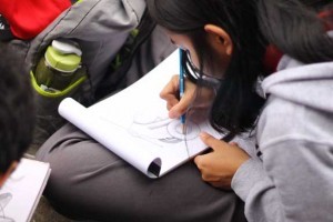 Alicia Cruz drawing a pilot airplane. Yes, you heard it right!